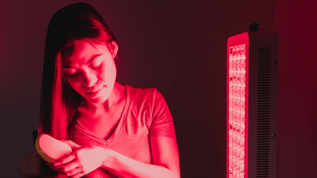 Woman using Orion 500 for hair growth. Orion Red Light Therapy based in Vancouver, BC Canada